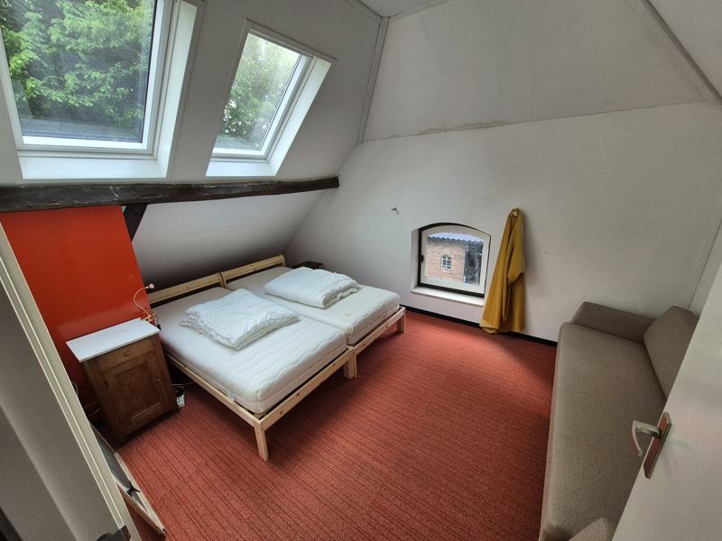 Slaapkamer met twee eenpersoonsbedden
